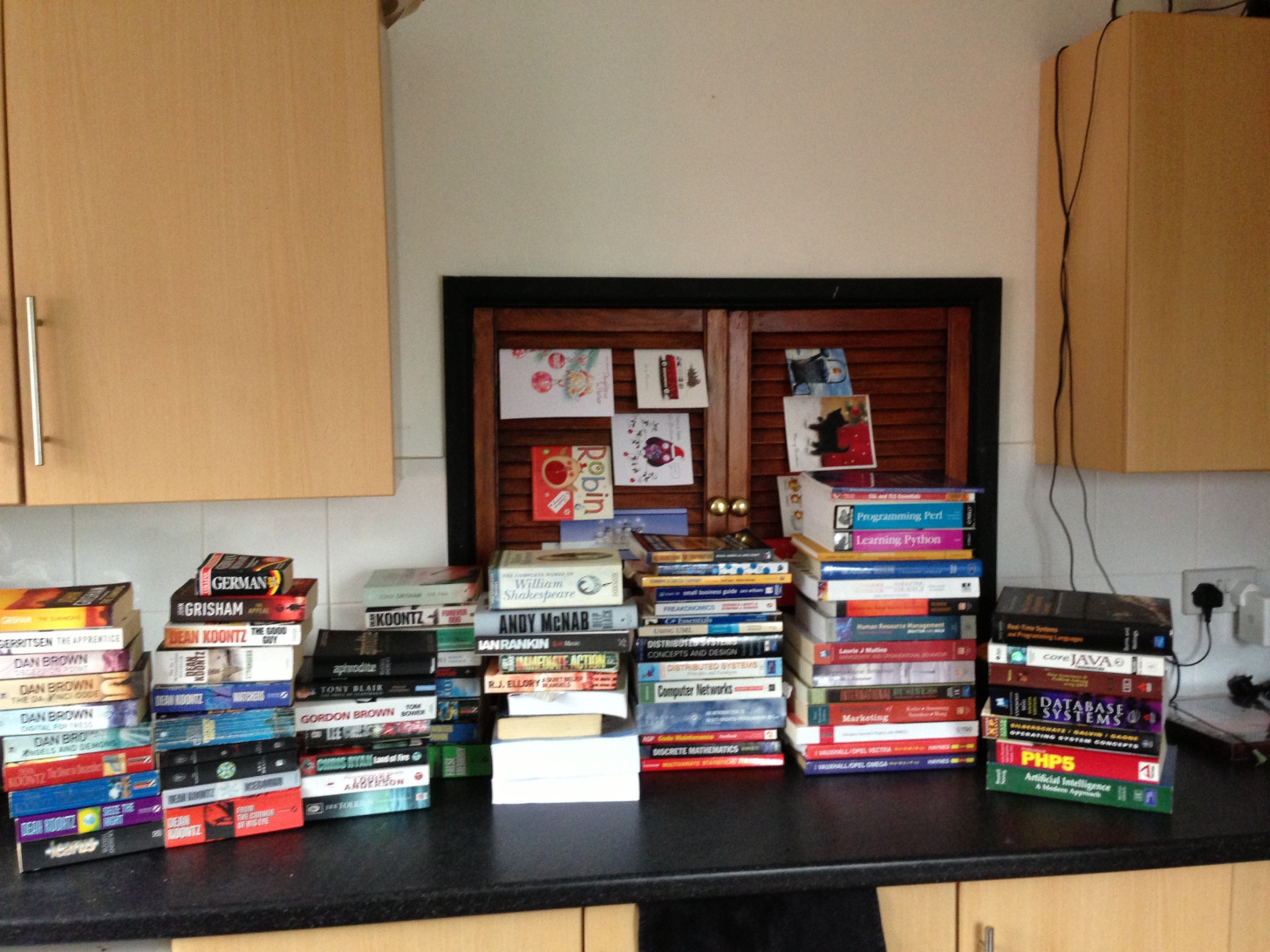 A pile of mouldy books on my kitchen table